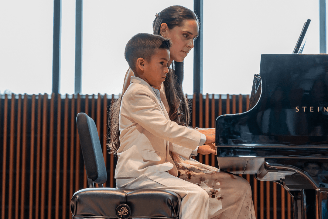 Begona teaching piano