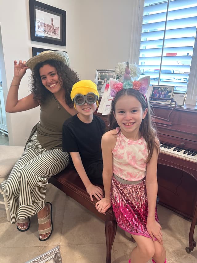 Maria teaching piano